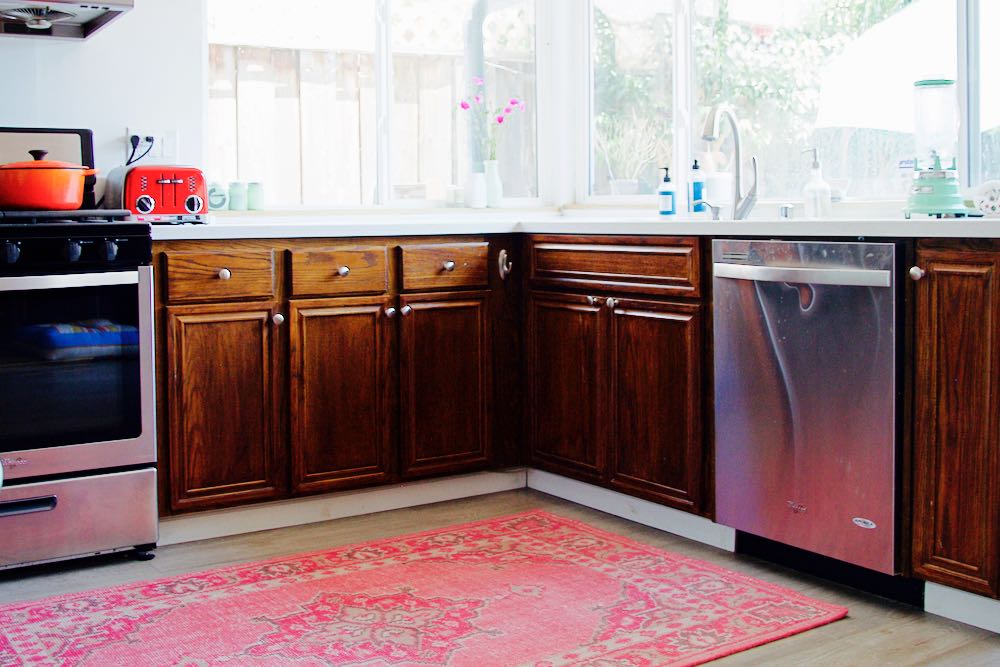 pink rug in the kitchen